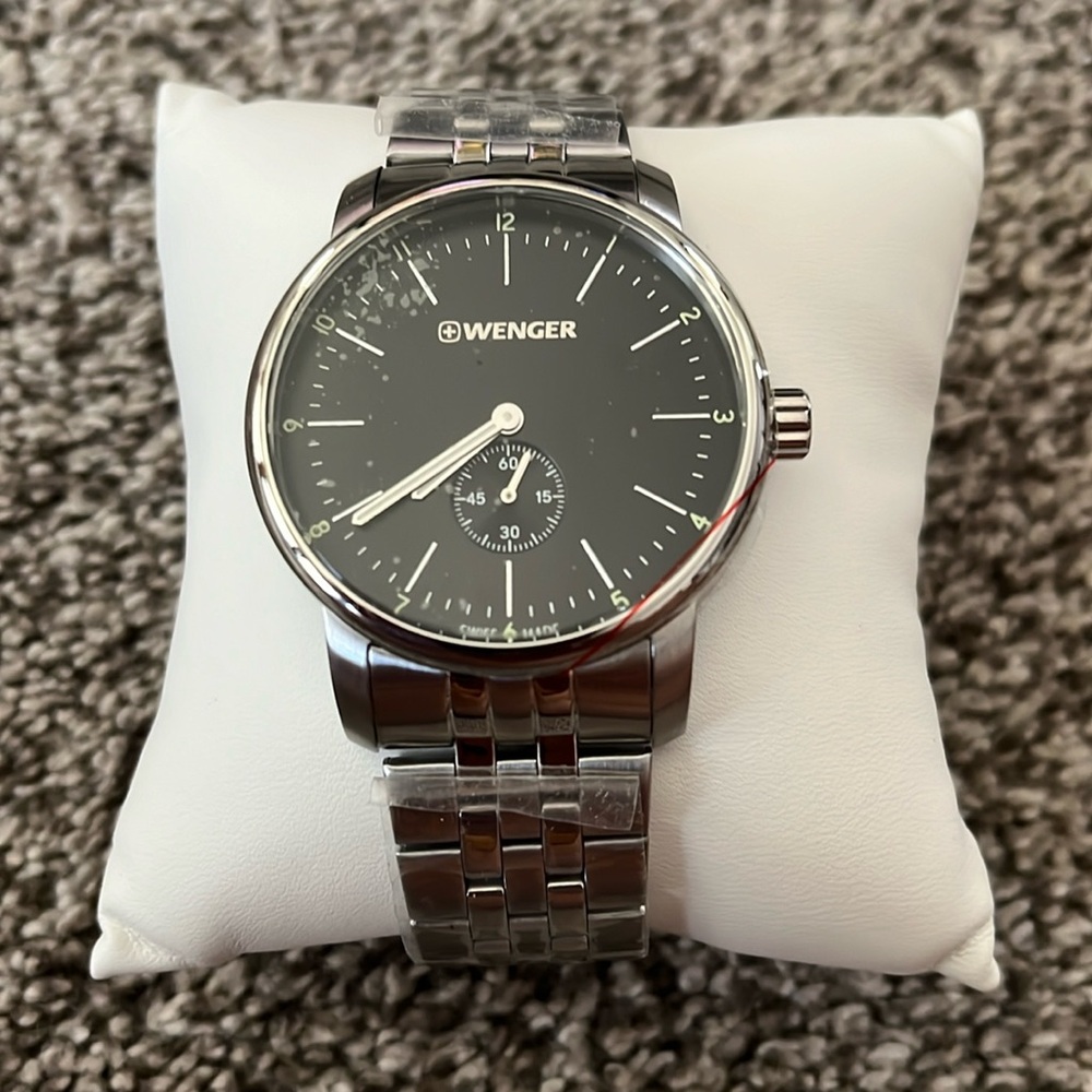 Wenger men’s watch- black dial with stainless steel bracelet. Classic style!